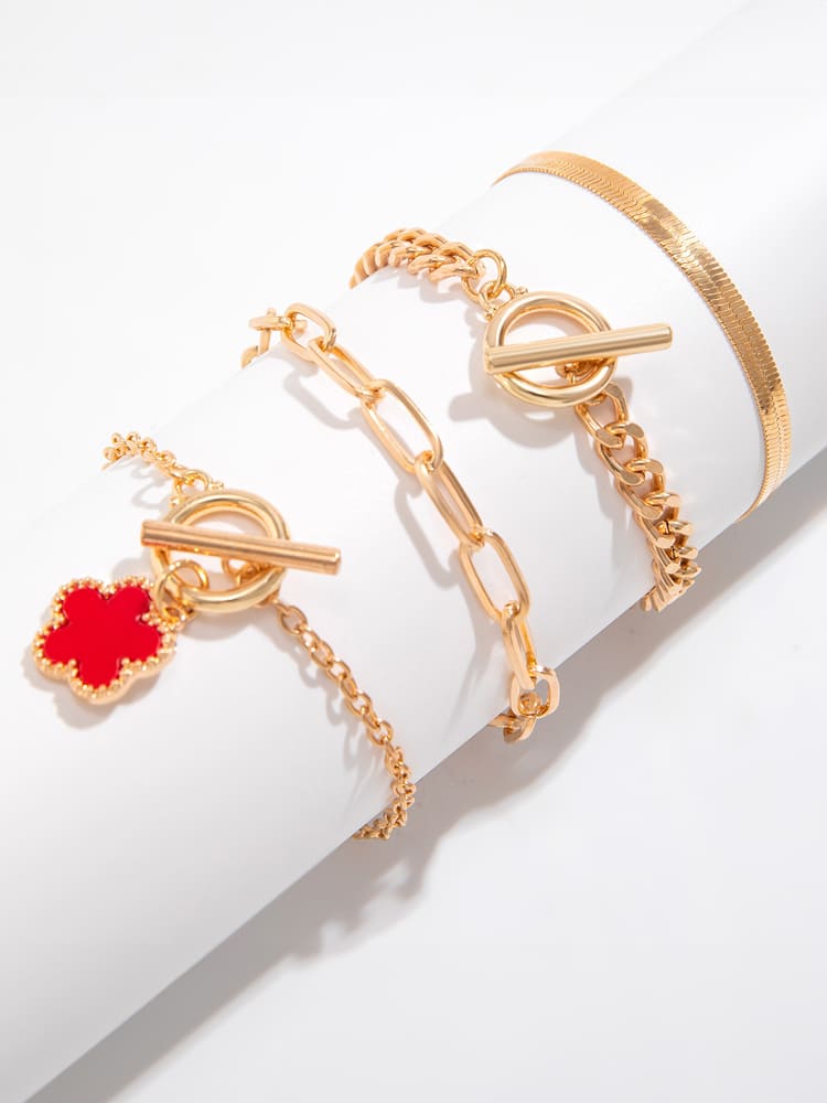 Náhrdelník z hadí kosti s náramky s trojlístkem