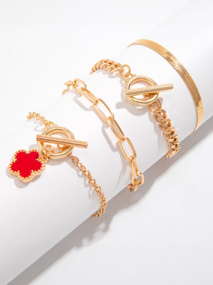 Náhrdelník z hadí kosti s náramky s trojlístkem