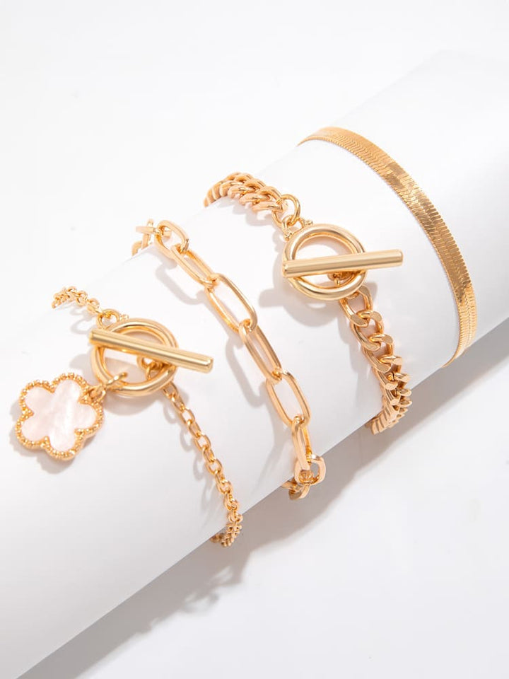 Náhrdelník z hadí kosti s náramky s trojlístkem