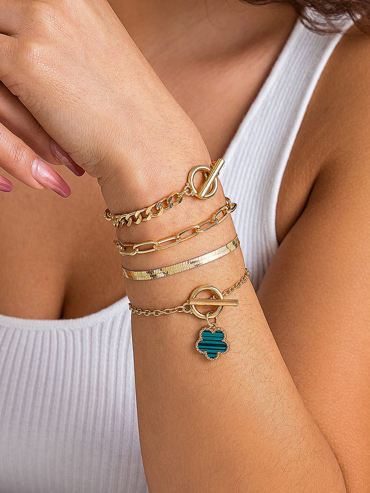 Náhrdelník z hadí kosti s náramky s trojlístkem